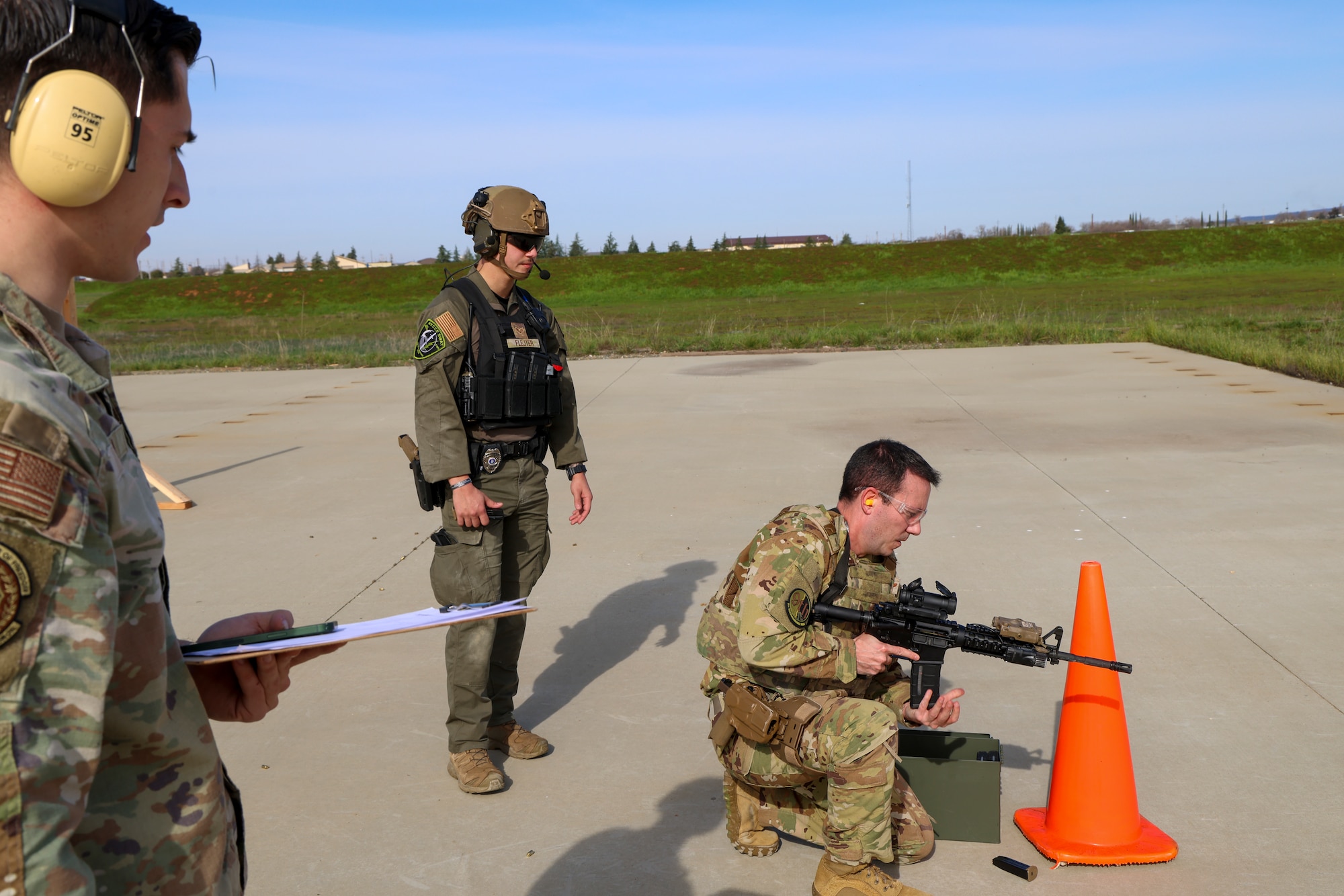 U.S. Air Force Capt. Dustin Fontenot, 427th Reconnaissance Squadron flight safety officer, loads a M4A1 Carbine during the shooting qualification of the Tactical Response Team (TRT) tryouts Feb. 12, 2024, at Beale Air Force Base, California.