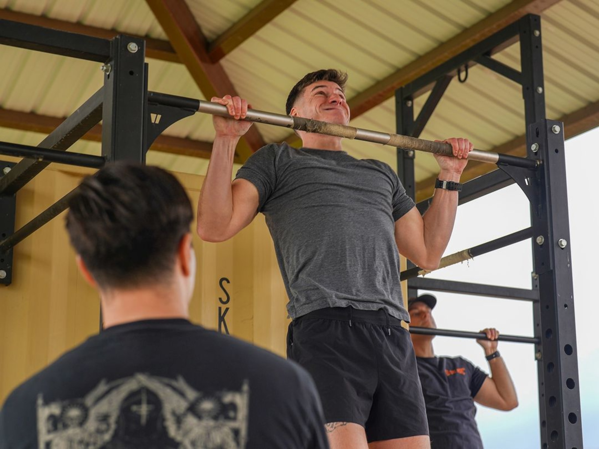 U.S. Air Force Senior Airman Noah Appelgren, 9th Reconnaissance Wing command post, senior emergency actions controller, performs pull-ups during the physical fitness qualification of the Tactical Response Team (TRT) tryouts Jan. 31, 2024, at Beale Air Force Base, California.