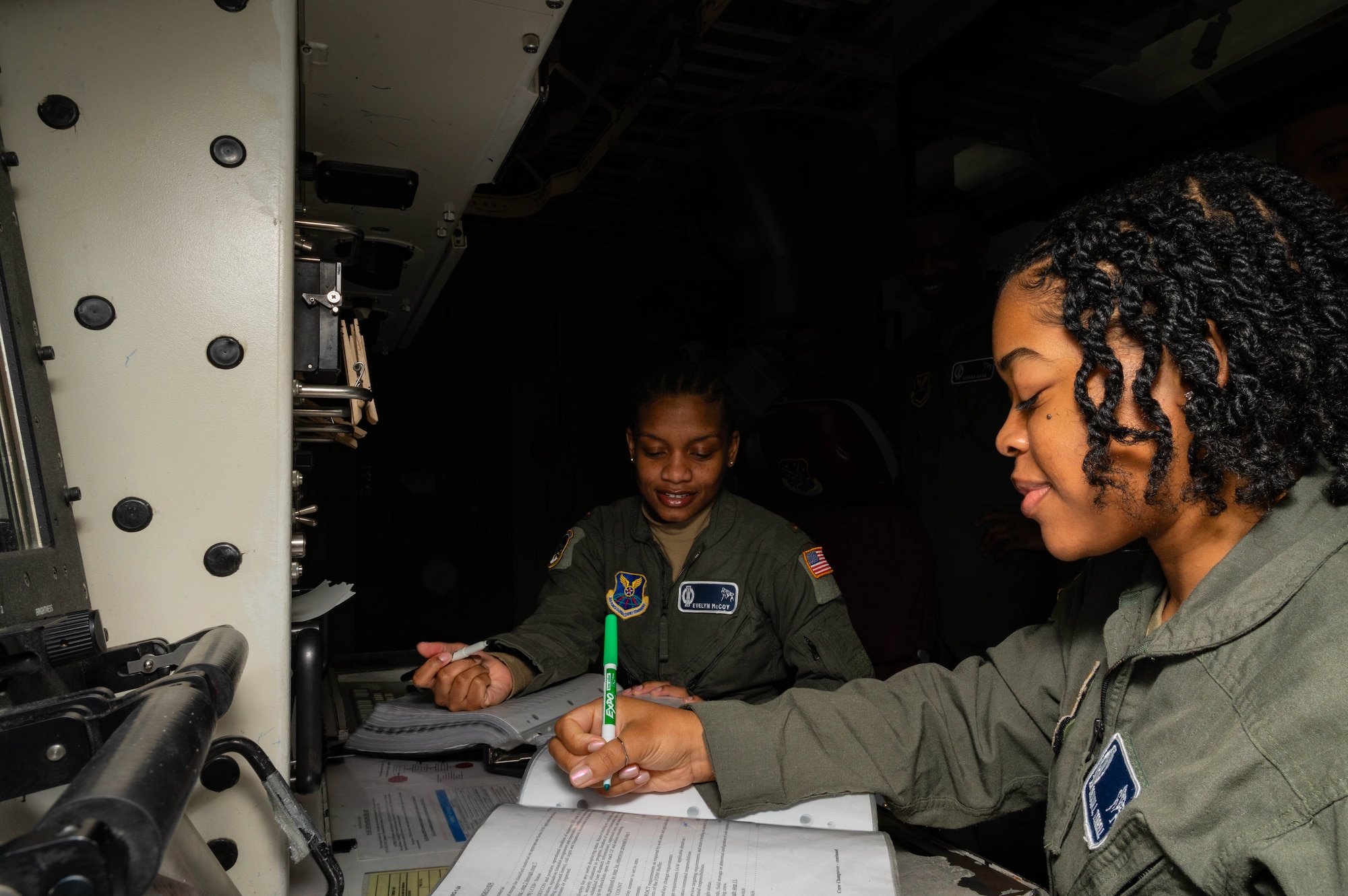 U.S. Air Force 1st Lt. Bryana Terell and 2nd Lt Evelyn McCoy, 742nd Missile Squadron missileers, train together in a missile procedure trainer in recognition of Black History Month at Minot Air Force Base, North Dakota, Feb. 20, 2024. The crew tripped out for a week where they performed a crucial role in the 91st Missile Wings’ nuclear deterrence mission, while also honoring the history and culture of black Americans. (U.S. Air Force photo by Senior Airman Alexander Nottingham)