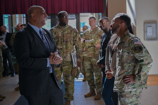  Man meets with Airmen
