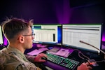 U.S. Air Force Senior Airman Andrew Cranley, 423d Security Forces Squadron Base Defense Operations Controller, monitors base operations at RAF Molesworth, England, Sept. 8, 2023. SFS members at the Base Defense Operations Center are responsible for coordinating security on the installation and remain ready to coordinate responses to ensure the safety and security of the community and mission.
