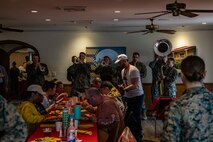 The Marine Corps Recruit Depot San Diego band performs for educators with Recruiting Stations’ Indianapolis, Kansas City, Milwaukee, and Twin Cities participating in the 2024 Educator’s Workshop during lunch on Feb. 20, 2024 at MCRD San Diego, California. Participants of the workshop visit MCRD San Diego to observe recruit training and gain a better understanding about the transformation from recruits to United States Marines. (U.S. Marine Corps photo by Sgt. Jesse K. Carter-Powell)