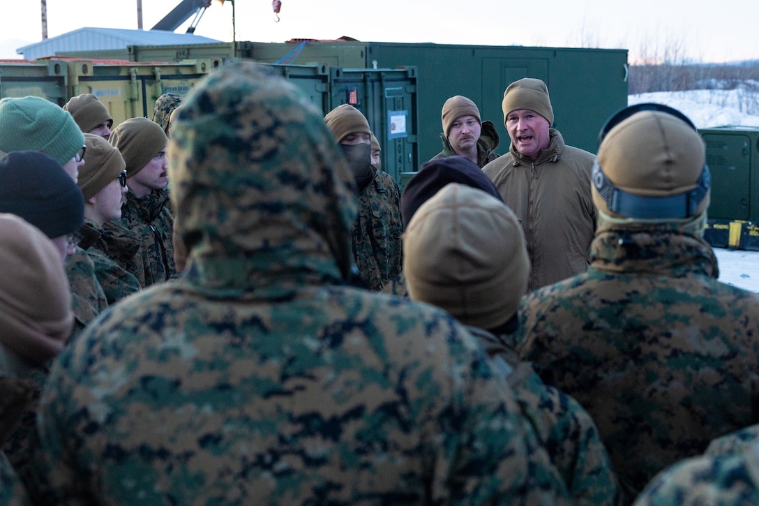 U.S. Marine Corps Col. Ryan P. Allen, Commanding Officer, Marine Air Control Group 48, 4th Marine Aircraft Wing, Marine Forces Reserve, discusses the strategic importance of training in an arctic environment with Marines with Marine Air Control Squadron (MACS) 24 at Fort Greely, Alaska, Feb. 10, 2024, in preparation for exercise ARCTIC EDGE 2024 (AE24). “Joint training opportunities like Arctic Edge 24 allow the Marines to cultivate proficiency and lethality, while developing the skills necessary to operate in the arctic environment”, said Allen. AE24 is a U.S. Northern Command-led homeland defense exercise demonstrating the U.S. Military's capabilities in extreme cold weather, joint force readiness, and U.S. military commitment to mutual strategic security interests in the Arctic region. (U.S. Marine Corps photo by Staff Sgt. Jestin Costa)