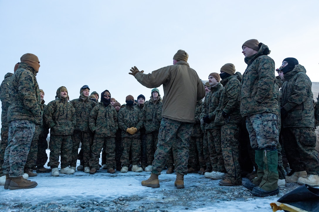 U.S. Marine Corps Col. Ryan P. Allen, Commanding Officer, Marine Air Control Group 48, 4th Marine Aircraft Wing, Marine Forces Reserve, discusses the strategic importance of training in an arctic environment with Marines with Marine Air Control Squadron (MACS) 24 at Fort Greely, Alaska, Feb. 10, 2024, in preparation for exercise ARCTIC EDGE 2024 (AE24). “Joint training opportunities like ARCTIC EDGE 24 allow the Marines to cultivate proficiency and lethality, while developing the skills necessary to operate in the arctic environment,” said Allen. AE24 is a U.S. Northern Command-led homeland defense exercise demonstrating the U.S. Military's capabilities in extreme cold weather, joint force readiness, and U.S. military commitment to mutual strategic security. (U.S. Marine Corps photo by Staff Sgt. Jestin Costa)