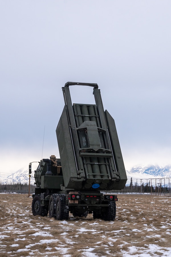 A U.S. Marine Corps High Mobility Artillery Rocket System (HIMARS) is deployed during drills in preparation of exercise Arctic Edge 2024 in Fort Greely, Alaska, Feb. 18, 2024. The HIMARS weapon system is a highly mobile artillery rocket system that fires six guided missiles in quick succession. ARCTIC EDGE 2024 (AE24) is a U.S. Northern Command-led homeland defense exercise demonstrating the U.S. military’s capabilities in extreme cold weather, joint force readiness, and U.S. military commitment to mutual strategic security interests in the Arctic region. (U.S. Marine Corps photo by Lance Cpl. Kanoa Thomas).