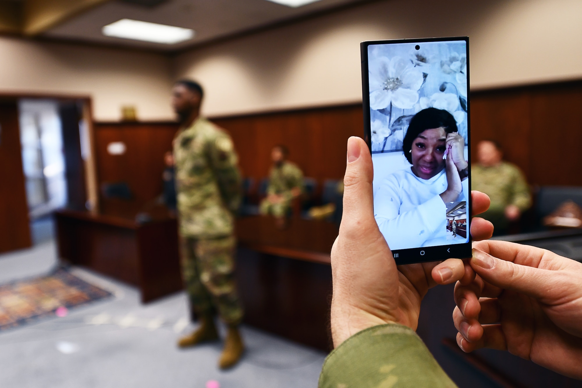 Mother watches her son become naturalized via video chat