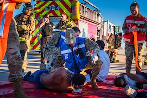 U.S. Air Force Airmen assigned to the 56th Medical Group and 56th Civil Engineer Squadron, simulate treating patients during a mass casualty exercise, Feb. 21, 2024, at Luke Air Force Base, Arizona.