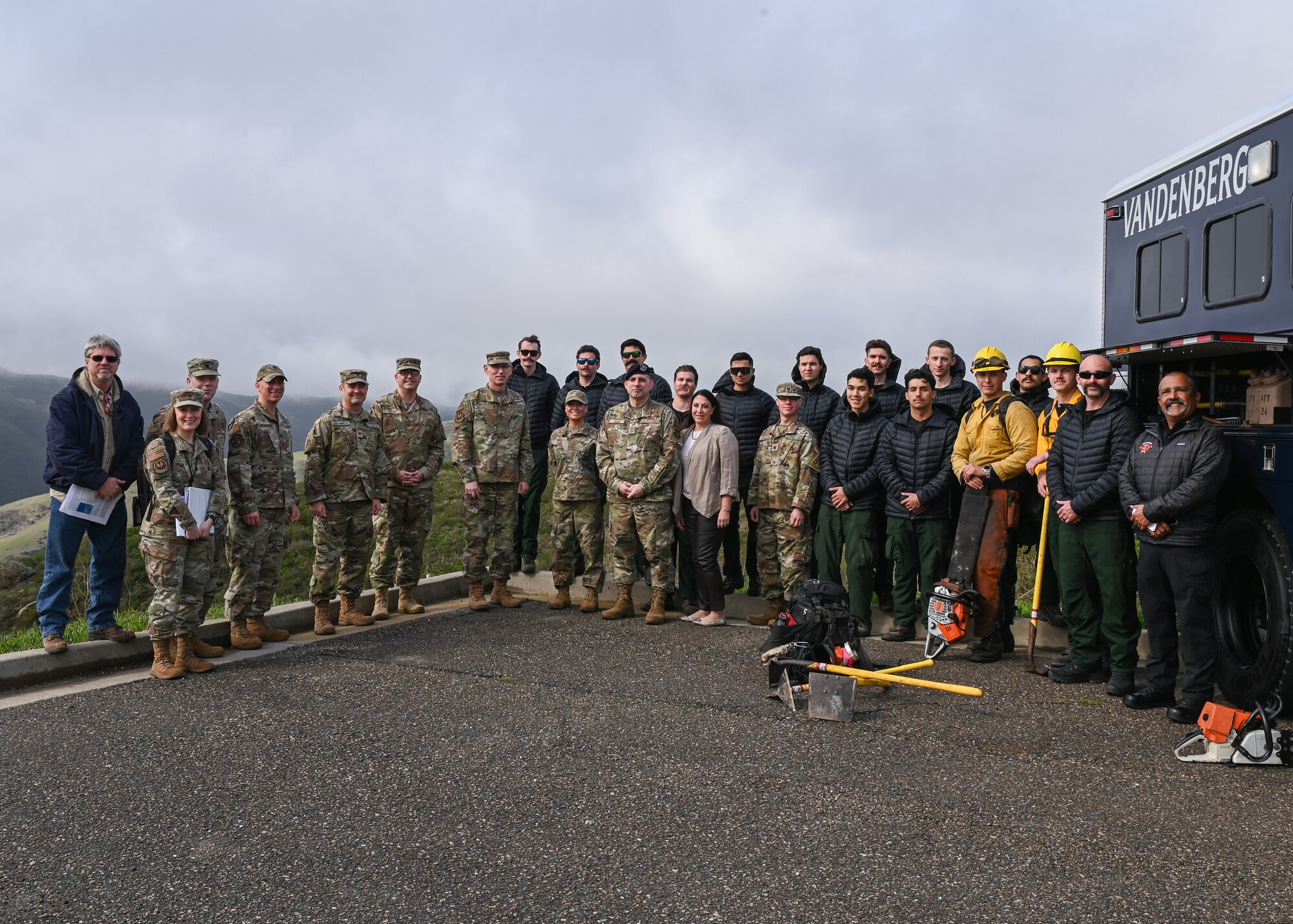 U.S. Air Force Gen. Duke Z. Richardson, Air Force Materiel Command commander, Space Launch Delta 30 leadership and Team V members, pose for a group photo during a tour at Vandenberg Space Force Base, Calif., Feb. 21, 2024.