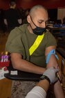 U.S. Marine Corps Recruit Jleonardo Alvarez with Kilo Company, 3rd Recruit Training Battalion, has his blood drawn as a part of the receiving process at Marine Corps Recruit Depot San Diego, California, Feb. 13, 2024. During receiving week recruits go through administrative and medical processing to ensure training and operational readiness. (U.S. Marine Corps photo by Lance Cpl. Janell B. Alvarez)