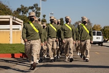 U.S. Marine Corps recruits with Kilo Company, 3rd Recruit Training Battalion, march to medical as a part of the receiving process at Marine Corps Recruit Depot San Diego, California Feb. 13, 2024. During receiving week recruits go through administrative and medical processing to ensure training and operational readiness. (U.S. Marine Corps photo by Lance Cpl. Janell B. Alvarez)