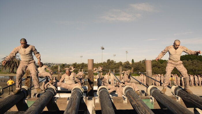 U.S. Marine Corps recruits with Golf Company, 2nd Recruit Training Battalion, participate in an obstacle course training event at Marine Corps Recruit Depot San Diego, California, Feb. 15, 2024. The O-Course includes obstacles recruits must overcome to enhance strength, agility, enhance, and confidence. (U.S. Marine Corps photo by Lance Cpl. Janell B. Alvarez)
