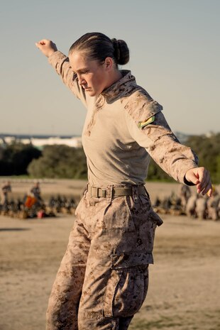 U.S. Marine Corps Recruit Emily Walker with Golf Company, 2nd Recruit Training Battalion, traverses an obstacle on the obstacle course at Marine Corps Recruit Depot San Diego, California, Feb. 15, 2024. The O-Course includes obstacles recruits must overcome to enhance strength, agility, enhance, and confidence. (U.S. Marine Corps photo by Lance Cpl. Janell B. Alvarez)