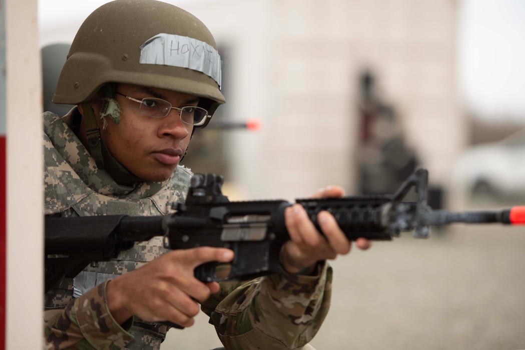 An Airman takes cover.