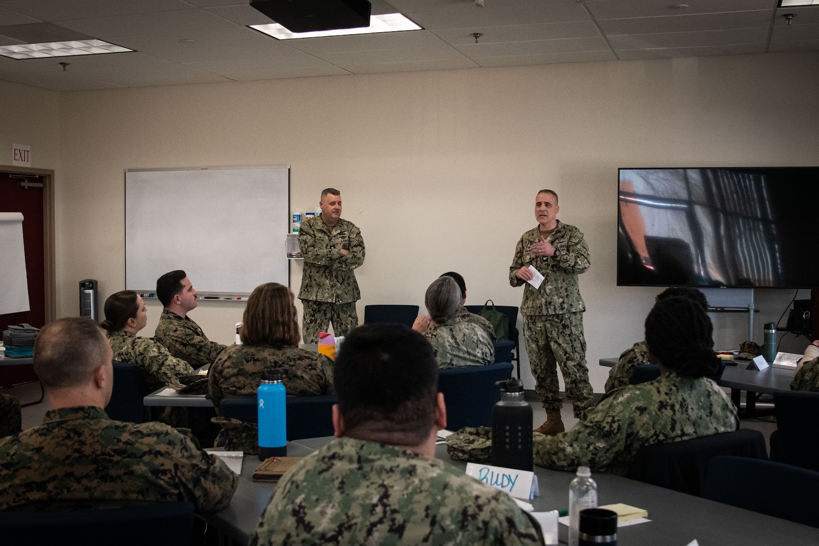 Navy Capt. Kevin Brown, Commander and Director of Naval Medical Center Camp Lejeune, speaks to Navy Officers serving aboard Marine Corps Air Station Cherry Point attending Intermediate Leadership Course on Feb. 15, 2024. The course is a multi-day training program intended to prepare intermediate Naval Officers for challenges they will face in future duty assignments.