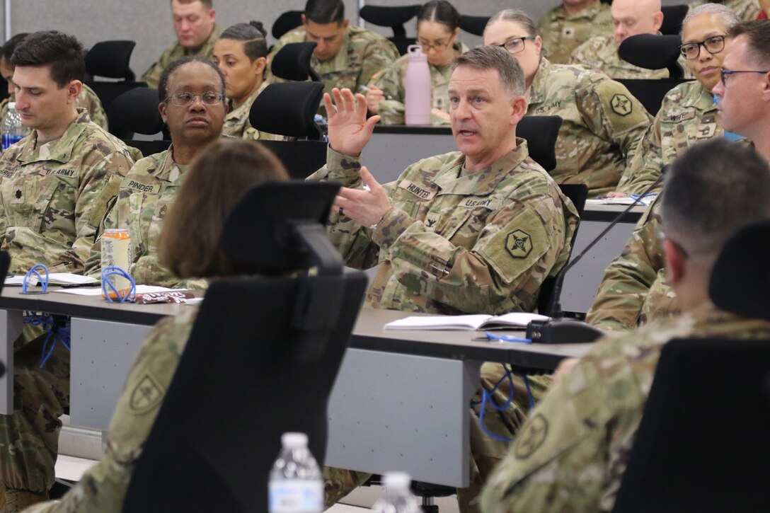 a senior leader Soldier briefs