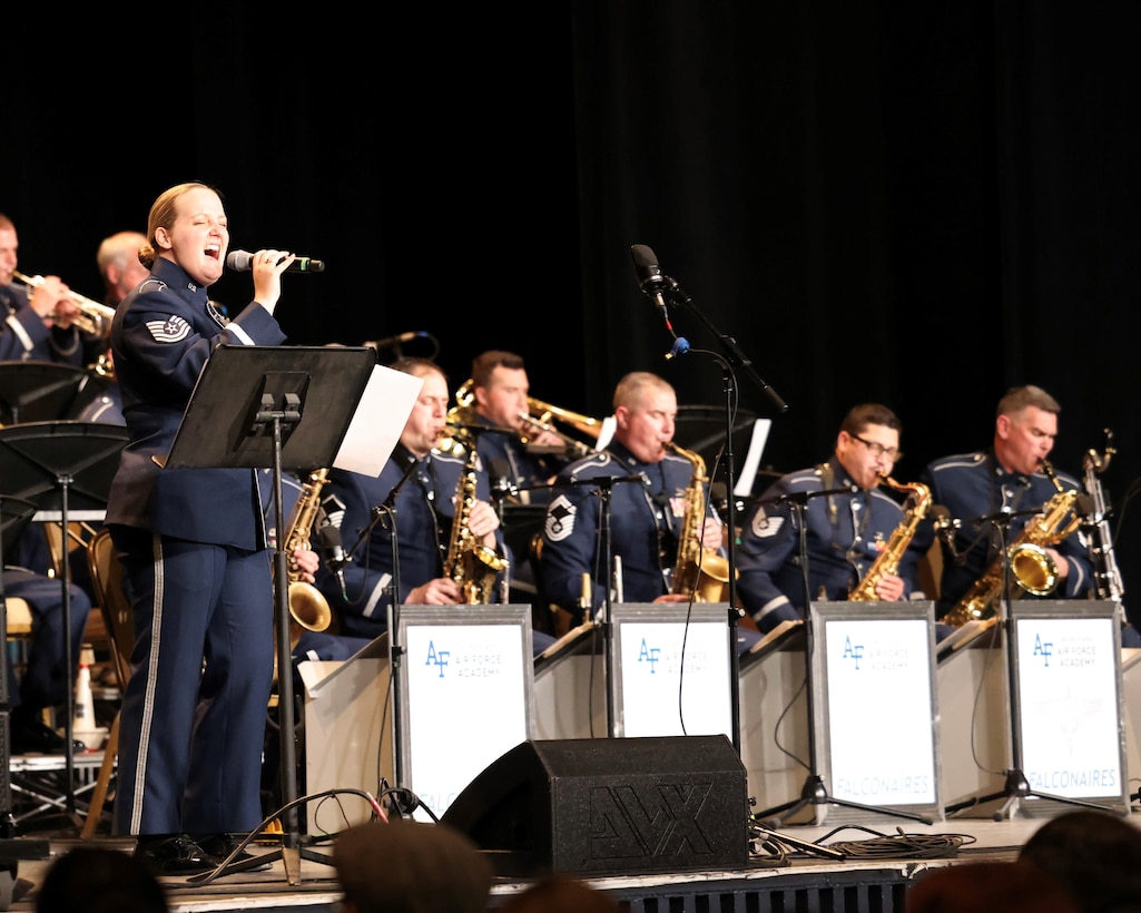 Falconaires Perfomance at CMEA with TSgt Kayla Richardson singing in front of the jazz band
