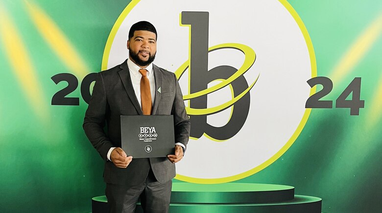 Roger Wilson, Navigation Chief of the U.S. Army Corps of Engineers, Mobile District Tennessee-Tombigbee Waterway Project office, poses with his Modern-Day Technology Leader Award at the 2024 Black Engineer of the Year Award ceremony in Baltimore, Maryland, Feb. 15, 2024. Wilson said he was astounded when he found out he won the award and said it is something he will cherish the rest of his career. (Courtesy photo)