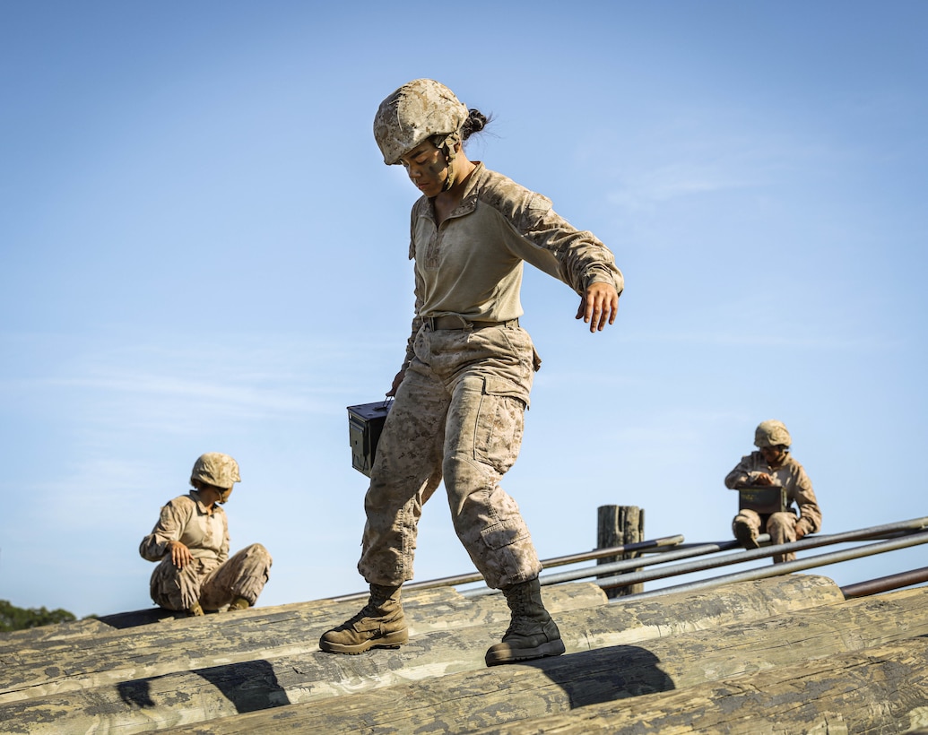 Private Daylien Diaz conducts the Obstacle Course during the Crucible on Marine Corps Recruit Depot, Parris Island, S.C., Nov. 7th, 2023. Pvt. Diaz graduated from recruit training Nov. 21 and will return to her profession as a police officer with the Miami-Dade Schools Police Department while serving in the Marine Corps Reserves. (U.S. Marine Corps photo by Lance Cpl. Ava Alegria)