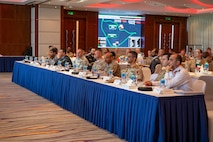 MANAMA, Bahrain (Feb. 21, 2024) Key military leaders and representatives from across the Gulf Cooperation Council and the Middle East listen to a strategic overview brief provided by Task Force 51/5th Marine Expeditionary Brigade (TF 51/5) during the Multilateral Maritime Engagement (MME) 24.1 in Bahrain, Feb. 21. MME 24.1 signifies the commitment of TF 51/5 and its regional partners to ensure stability, enhance regional opportunities, and build partnerships that can effectively respond to dynamic crises. This conference serves as a testament to the dedication and cooperation among the participating nations, highlighting their shared goal of promoting regional stability and security. (U.S. Marine Corps photo)