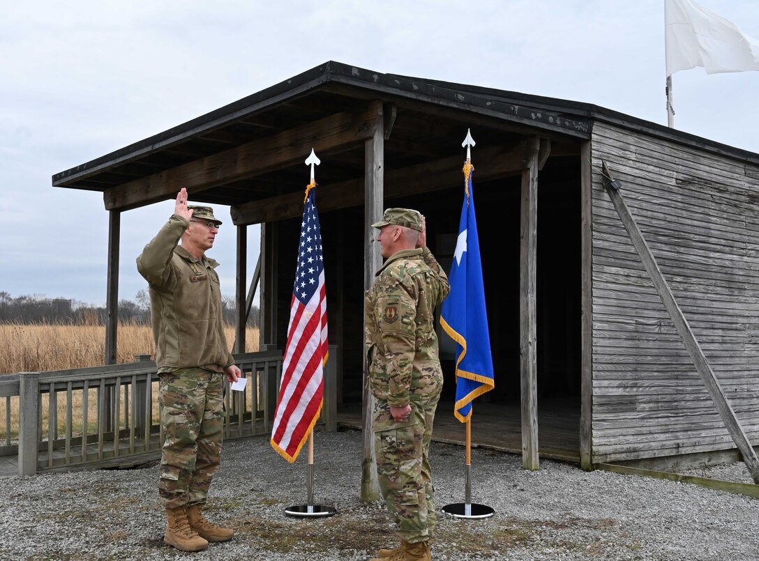 photo of two Airmen at ceremony
