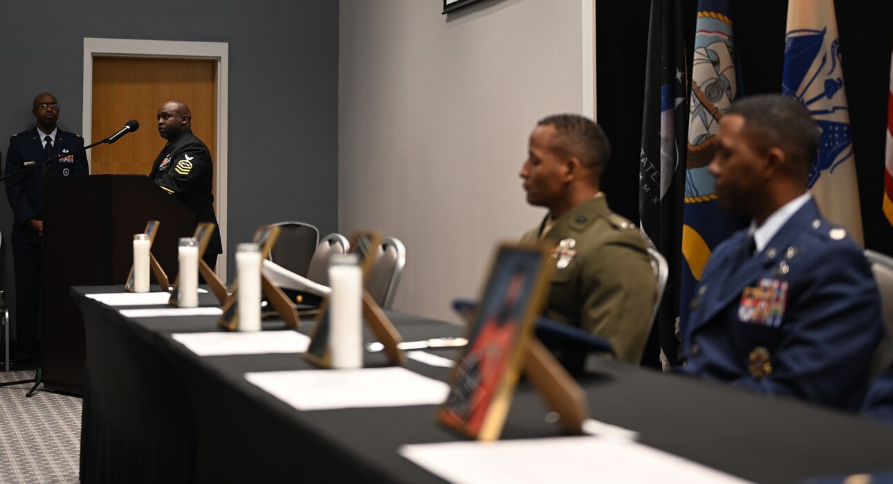 U.S. Navy Chief Petty Officer Dustin Shed, CNATTU Learning Site senior enlisted advisor, gives a speech as other military members listen during the Black History Month luncheon at the Powell Event Center, Goodfellow Air Force Base, Texas, Feb. 16, 2024. National Black History Month has its origins in 1915 when historian and author Dr. Carter G. Woodson founded the Association for the Study of Negro Life and History. (U.S. Air Force Photo by Staff Sgt. Nathan Call)