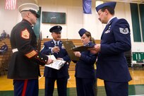 Alaska Air National Guardsman volunteers as JROTC drill judge