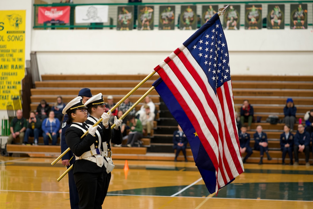 Alaska Air National Guardsman volunteers as JROTC drill judge