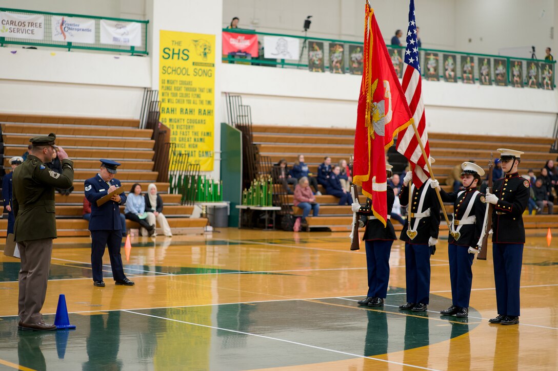 Alaska Air National Guardsman volunteers as JROTC drill judge