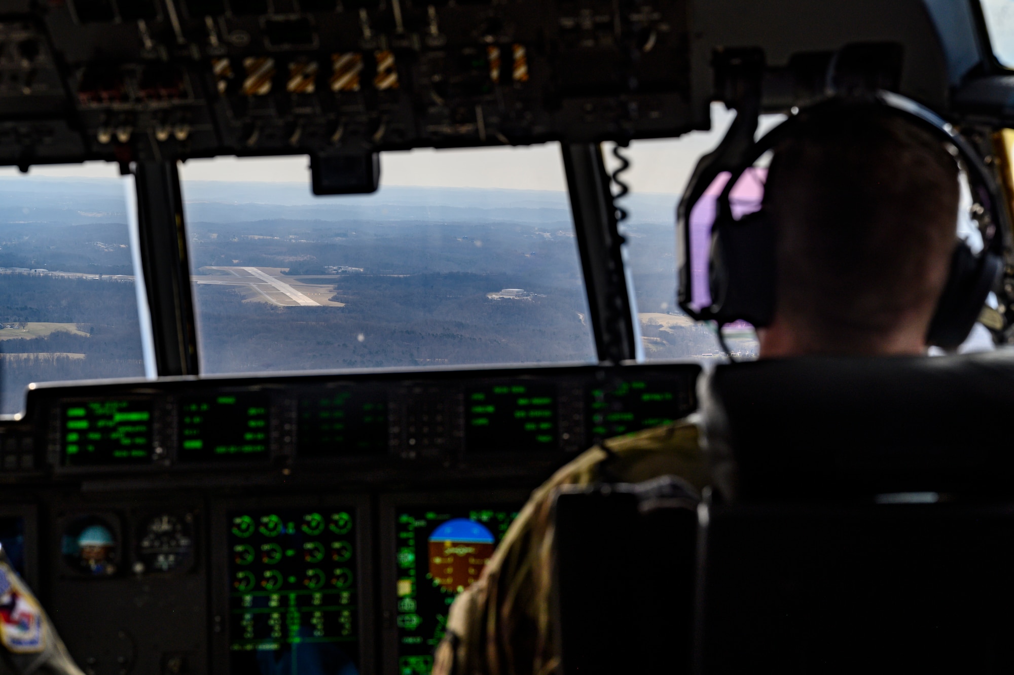 A C-130J-30 assigned to the 130th Airlift Wing, McLaughlin Air National Guard Base, W.Va., approaches a runway in preparation for a “touch-and-go” maneuver at the Mid-Ohio Valley Regional Airport, Williamstown, W.Va. on Feb. 8, 2024. A touch-and-go involves landing on a runway and taking off without coming to a complete stop. (U.S. Air National Guard photo by 2nd Lt. De-Juan Haley)