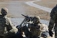 A Soldier assigned to the 34th Division Sustainment Brigade, Illinois National Guard, qualifies with the M2 50-caliber machine gun during the unit's culminating training exercise and associated mobilization and deployment, February 2024 at Fort Knox, Kentucky.