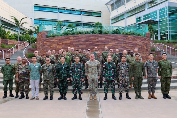 Internation Fellows and U.S. Army Pacific Commanding General Charles A. Flynn stand for a group photo during a visit to the U.S. Army Pacific Headquarters visit on Fort Shafter, HI Feb. 21, 2024. Each year approximately eighty senior military officers from around the world are extended an invitation from the Chief of Staff of the United States Army to attend the United States Army War College. (U.S. Army photo by Spc. Taylor Gray)