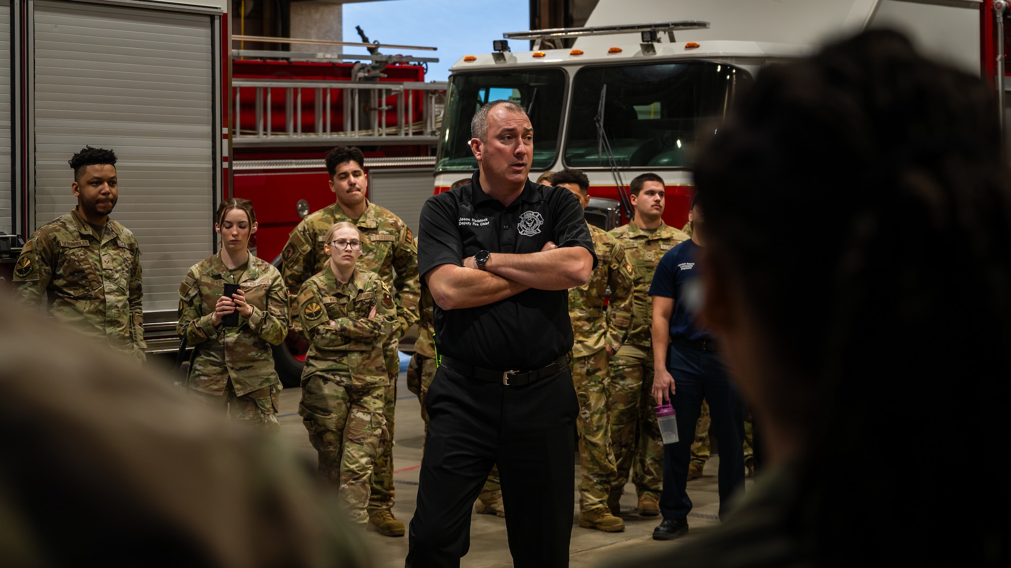 Jason Haddock, 56th Civil Engineer Squadron deputy fire chief, briefs participants before a mass casualty exercise, Feb. 21, 2024, at Luke Air Force Base, Arizona.