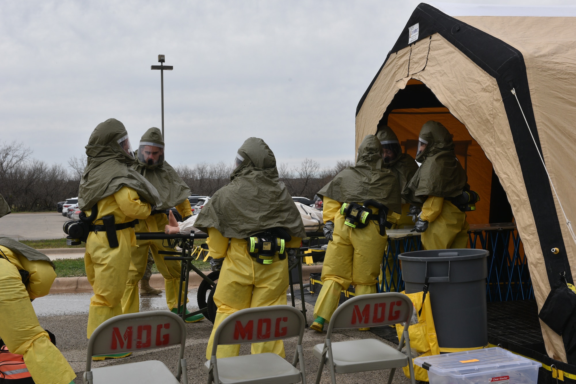 Members of the 17th Medical Group participate in an in-place patient decontamination training at Goodfellow Air Force Base, Texas, Feb. 8, 2024. Participating members went through practical exercises to help prepare for this possibility, such as setting up a decontamination tent in less than 15 minutes. (U.S. Air Force photo by 2nd Lt. Kayunna Holt)
