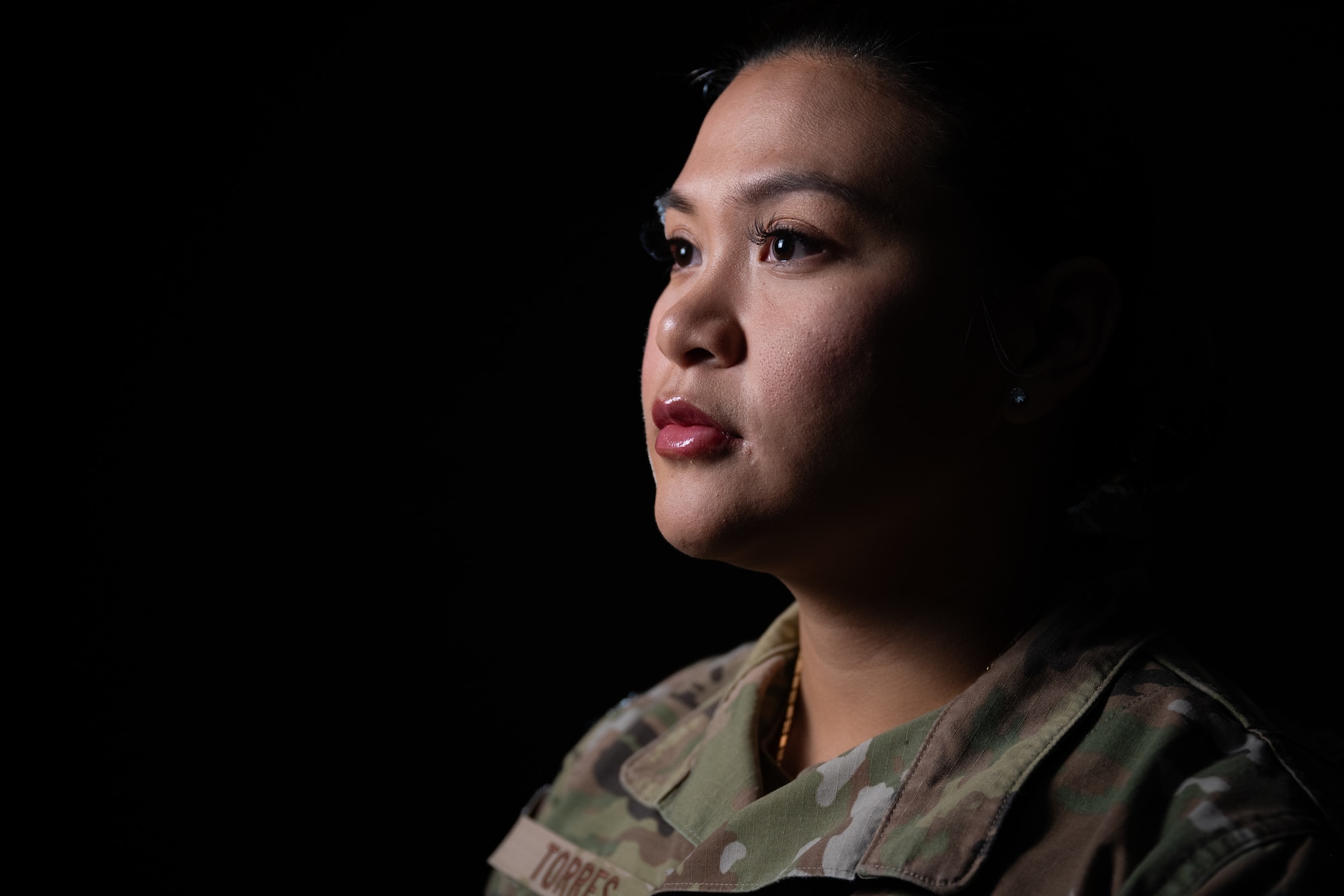 U.S. Air Force Staff Sgt. Myka Torres, a 1st Special Operations Security Forces Squadron base defense operations center controller, poses for a photo at Hurlburt Field, Florida, Feb. 6, 2024. The Air Force builds multi-capable Airmen through language based programs in order to enhance global communication, foster cultural understanding, and empower personnel with the diverse skills needed to navigate complex international environments and missions. (U.S. Air Force photo by Senior Airman Alysa Calvarese)