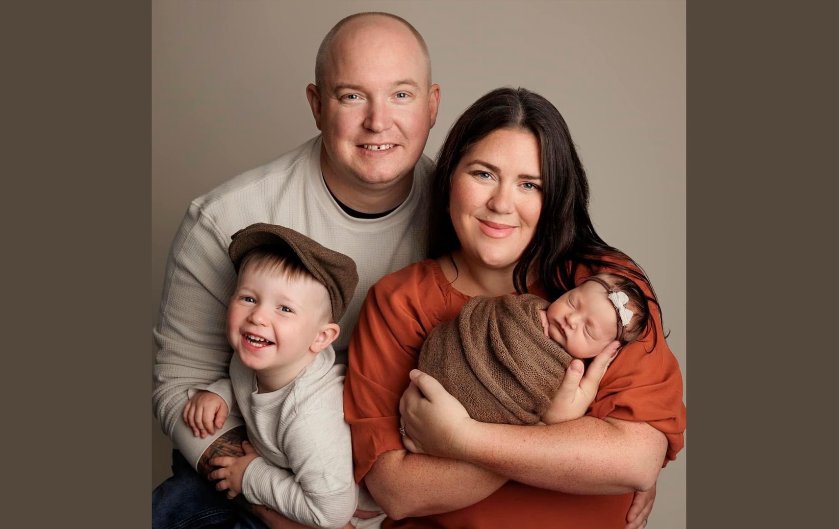 Chief Petty Officer Robert Elliott and wife, Taylor, with their son, Macklin, and daughter, Matilda. Chief Elliott has used both tuition and credentialing assistance to build a strong record of professional development.