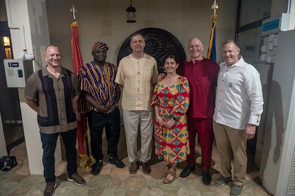 From left, Command Sgt. Maj. Eric Binstock, North Dakota Army National Guard state command sergeant major; 2nd Lt. Denis Duku, 426th Signal Company; Maj. Gen. Al Dohrmann, adjutant general; Maj. Beth Simek, North Dakota bilateral affairs officer for Ghana; Lt. Col. Jarrod Simek, U.S. Special Operations Command Africa, and Lt. Col. Mark McEvers take a photo at the 20th-anniversary celebration of North Dakota and the Republic of Ghana's partnership in the State Partnership Program, Feb. 22, 2024, in Accra, Ghana. North Dakota and Ghana are one of 18 partnerships in Africa.