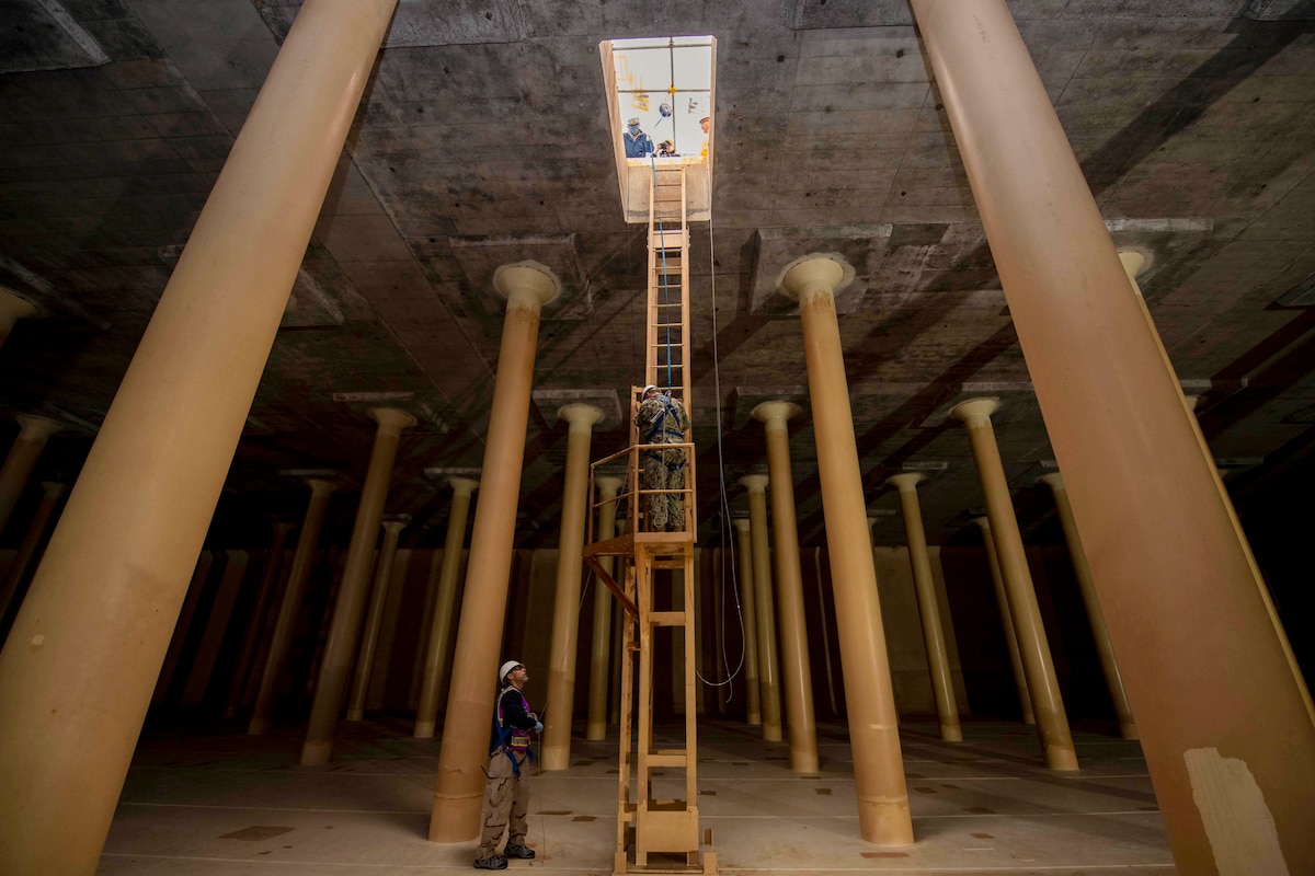 Navy Capt. Michael Fontaine inspects the I-4 fuel tank, the Defense Department's largest, at Commander Fleet Activities Sasebo, Japan, Feb. 14, 2024. The inspection is part of the tank's 20-year cleaning cycle to maintain structural integrity and readiness.