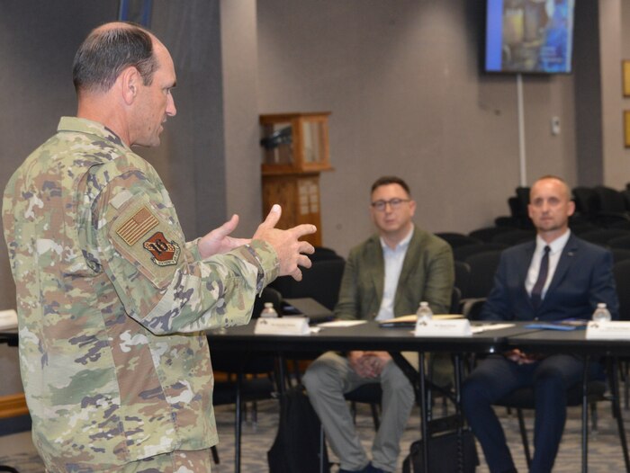An Airman addressing an audience.