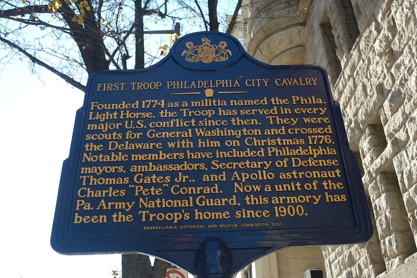 A historical marker outside First Troop Philadelphia City Cavalry's armory in Philadelphia. (Pennsylvania National Guard photo by Brad Rhen)