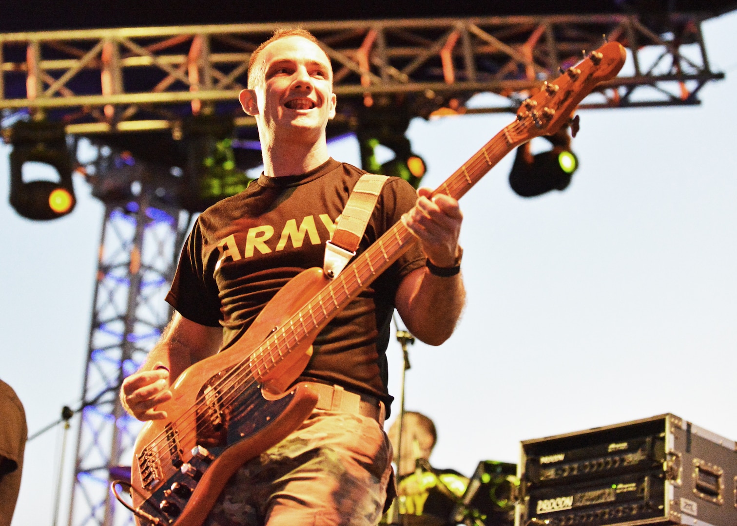 Staff Sgt. Chazz Rogers of the New Hampshire National Guard’s 39th Army Band plays bass guitar during a 39th Army Band performance at the Ilopango air show Feb. 17, 2024, in El Salvador.