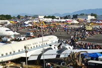 Thousands of spectators converge on the Ilopango International Airport Feb. 17, 2024, in El Salvador. Eight soldiers from the Hampshire National Guard’s 39th Army Band performed two hour-long performances during the event.