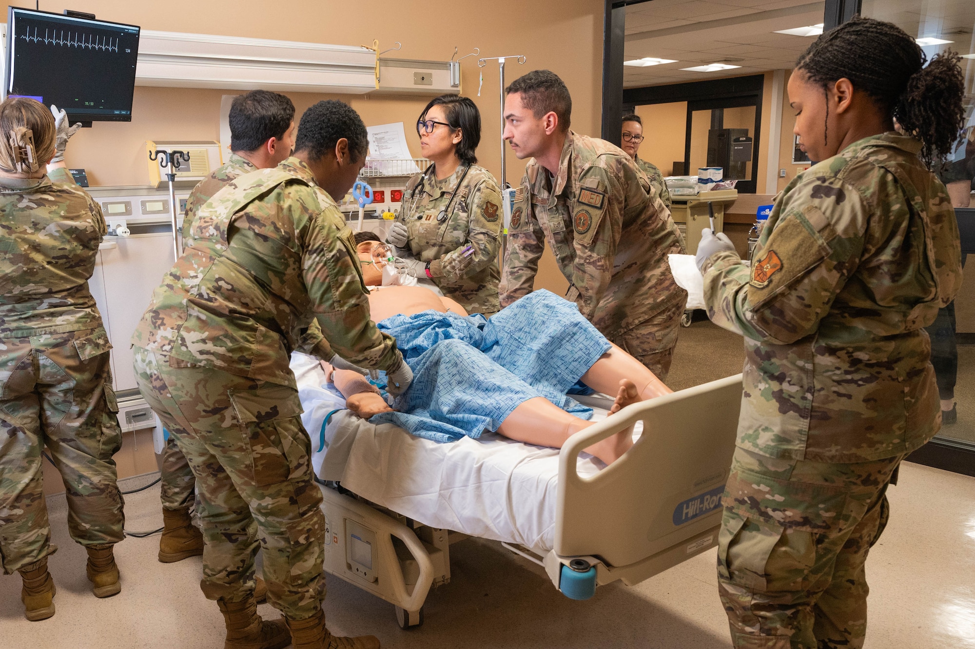 Medics treat a simulated patient