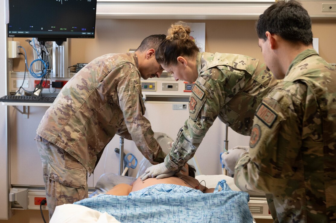 Medics perform CPR on simulated patient