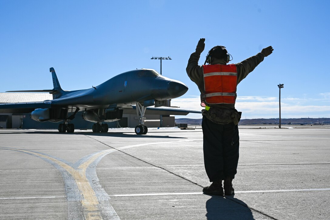 28th AMXS crewmember marshals B-1B Lancer