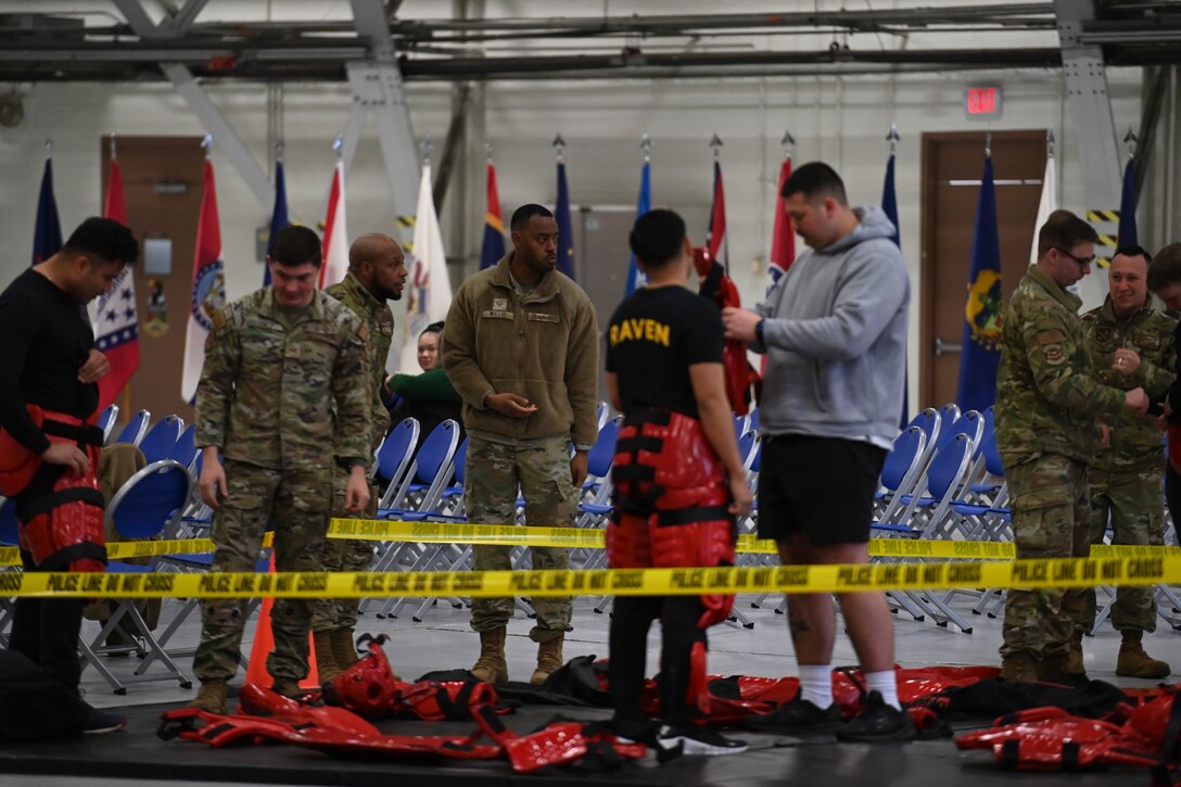U.S. Air Force Security Forces dawn Redman suits for Redman Baton Training challenge.