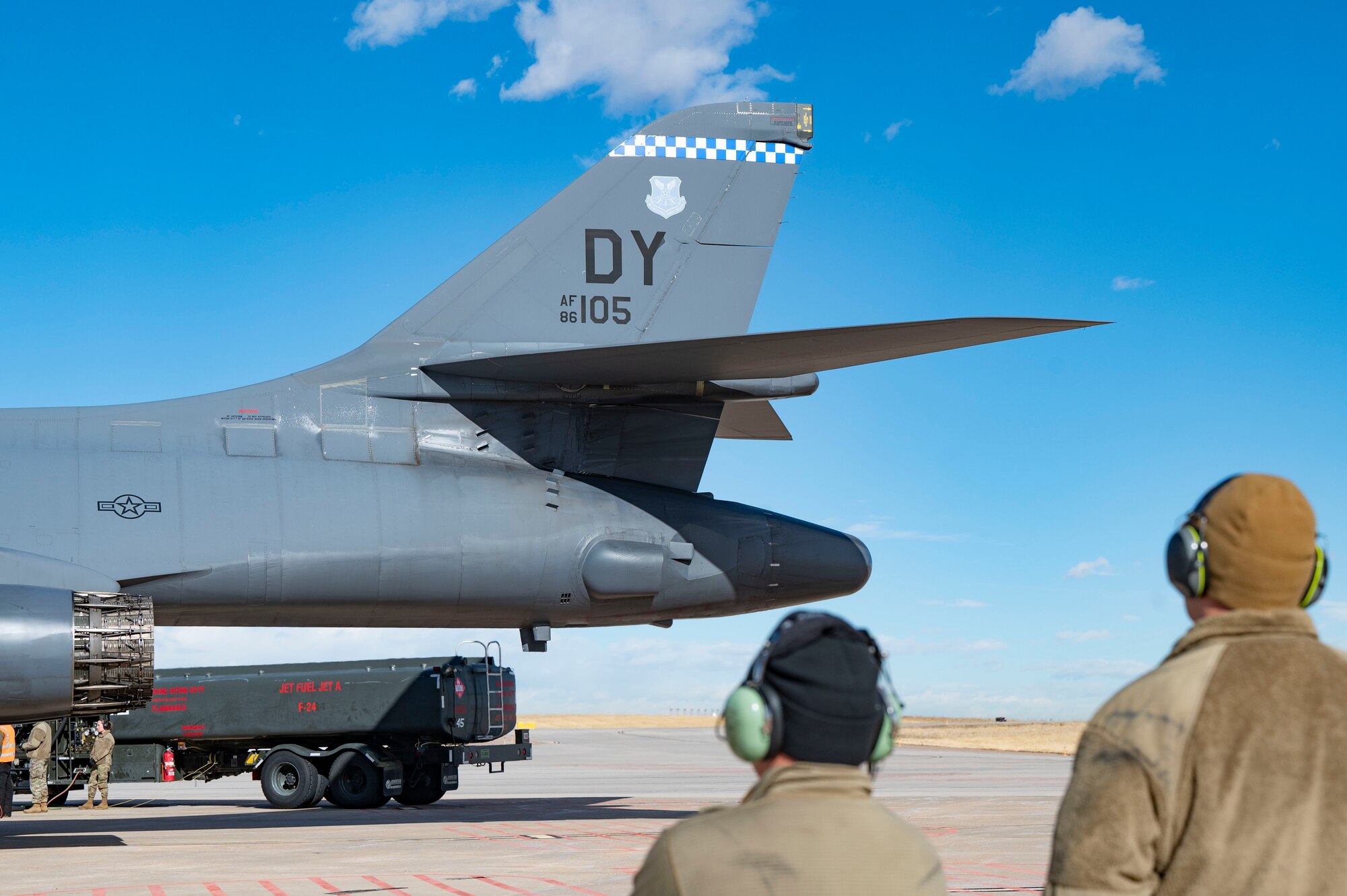 A B-1B Lancer assigned to Dyess Air Force Base hot pit refuels at Buckley Space Force Base, Colorado, Feb. 14, 2024. The aircraft refueled before integrating with F-16 Fighting Falcons from the 140th Wing; coordination between these aircraft improve operational flexibility. (U.S. Air Force Photo by Airman 1st Class Emma Anderson)