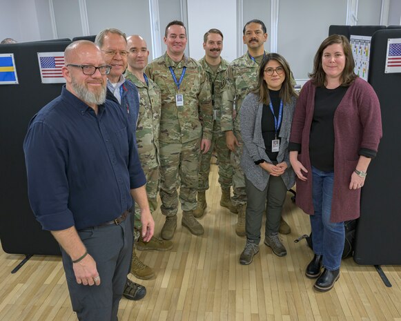 People gather together for a photo.