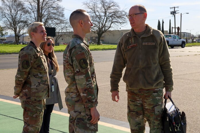 U.S. Air Force Gen. Duke Z. Richardson, Air Force Materiel Command commander, talks to Col. Geoffrey Church, 9th Reconnaissance Wing commander, during a trip to Beale, Feb. 22, 2024, at Beale Air Force Base, California.