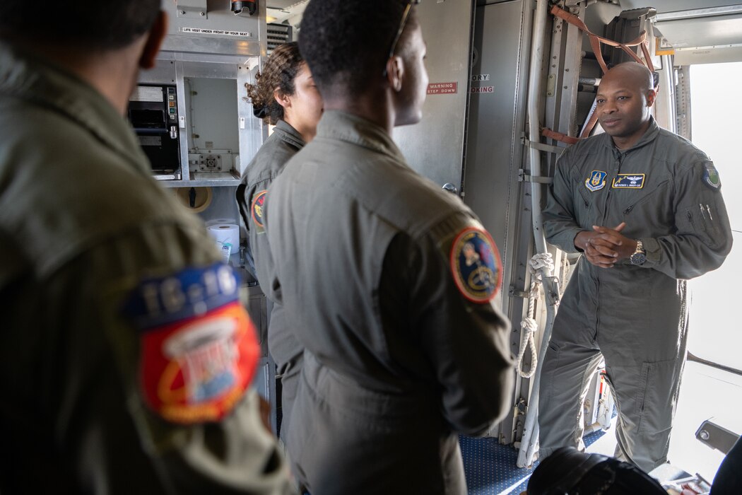 U.S. Air Force Col. Patrick L. Brady-Lee, 349th Air Mobility Wing commander, speaks to U.S. Air Force Academy cadets aboard a KC-10 Extender at Peterson Space Force Base, Colorado, Feb. 15, 2024.