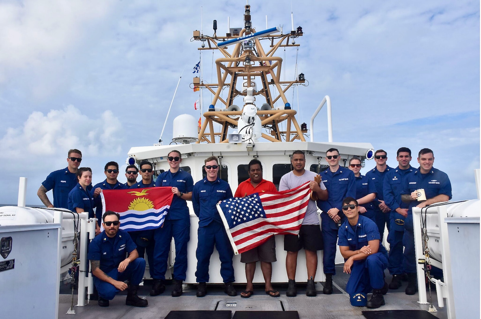 The USCGC Oliver Henry (WPC 1140) crew and Kiribati Police Maritime Unit officers and recruits stand for a photo in Tarawa, Kiribati, on Feb. 16, 2024. For the first time since 2015, the patrol incorporated shipriders from the PMU, executing the maritime bilateral agreement signed with Kiribati in 2008. These engagements under Operation Blue Pacific emphasize the United States' commitment to strengthening ties and ensuring maritime security within the Pacific community. (U.S Coast Guard photo by Lt. j.g. Nicholas Haas)